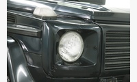 Обшивка фары левая (очки) Mercedes-Benz G (W463) 1997-2015