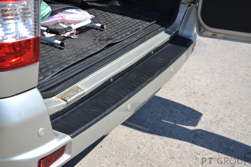 Накладка на задний бампер УАЗ Патриот 2014- (черное тиснение, ABS)